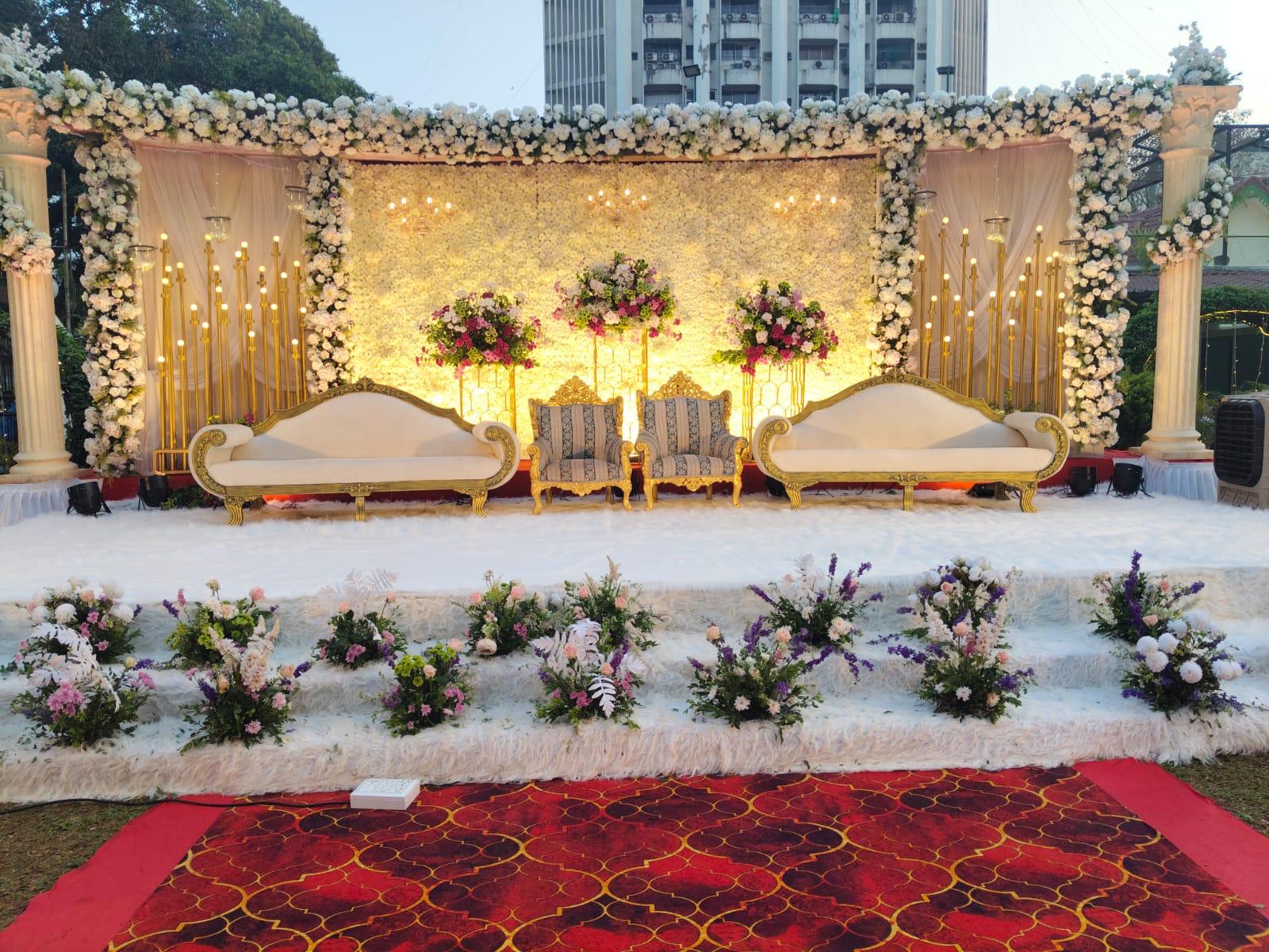 Original royal gold carved wedding stage setup by AS Decor & Events